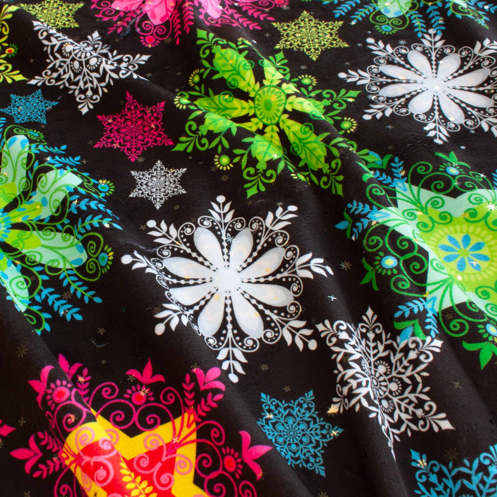Neon Snowflakes holiday print minky fabric, draped