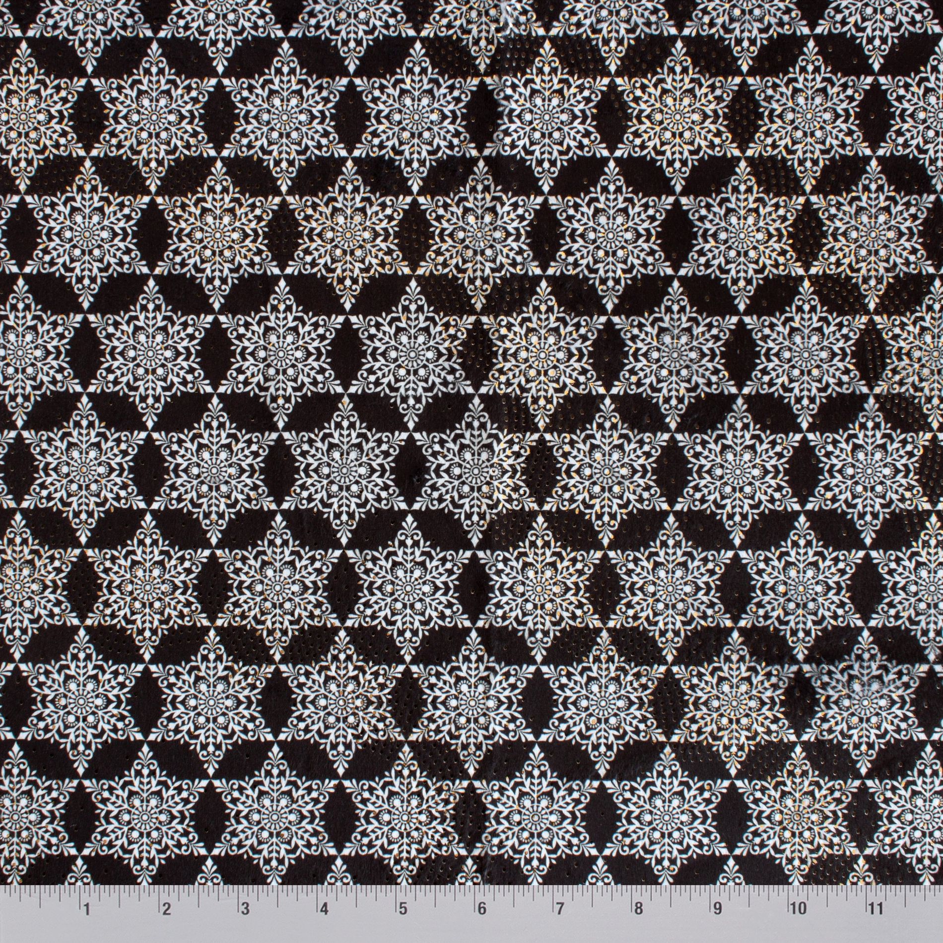 Snowflake Ditsy snowflake print minky fabric, close-up