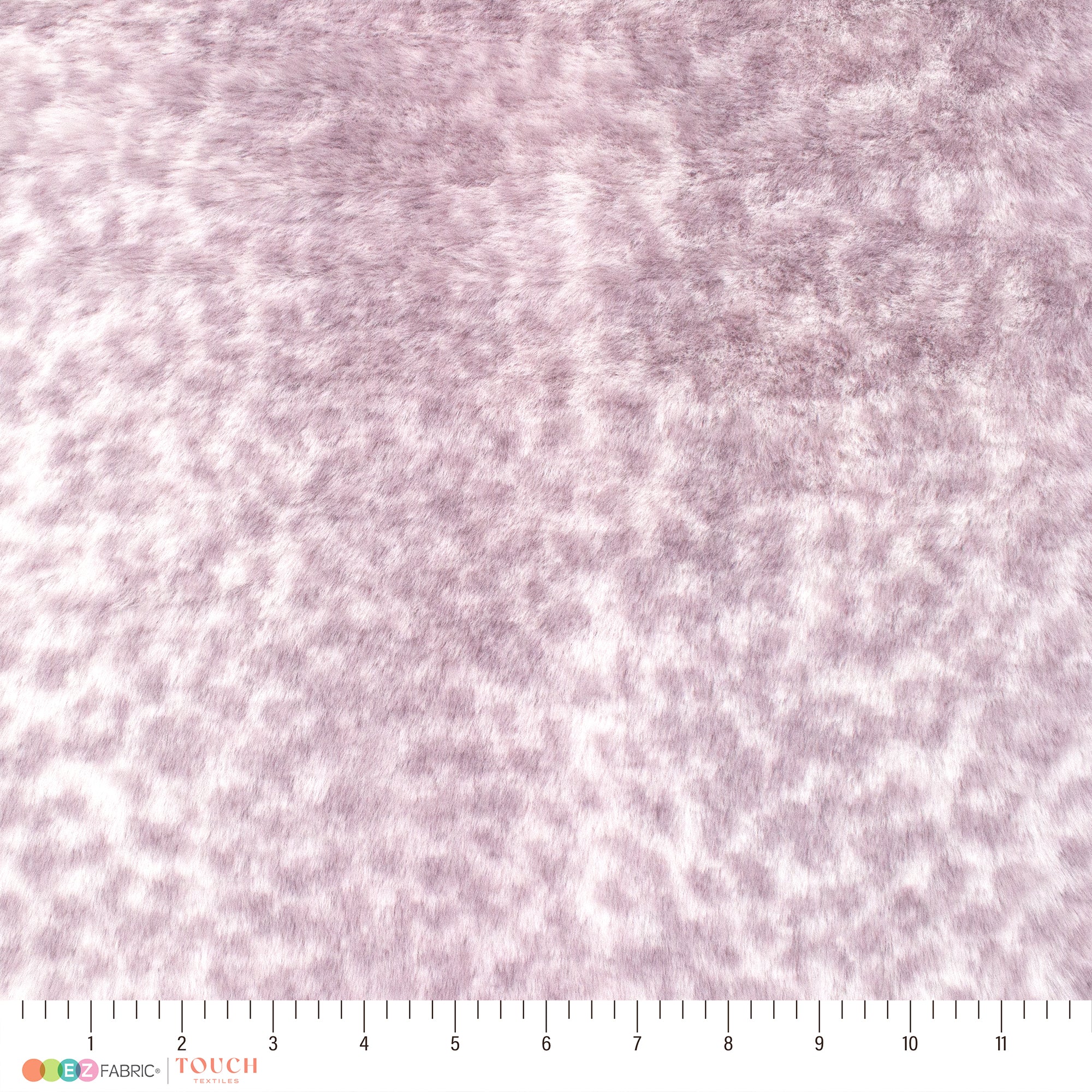 Baby Leo Whispy Snuggle, hand touching fabric for softness reference