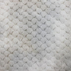 Tie dye Modo Snuggle fabric, edge view
