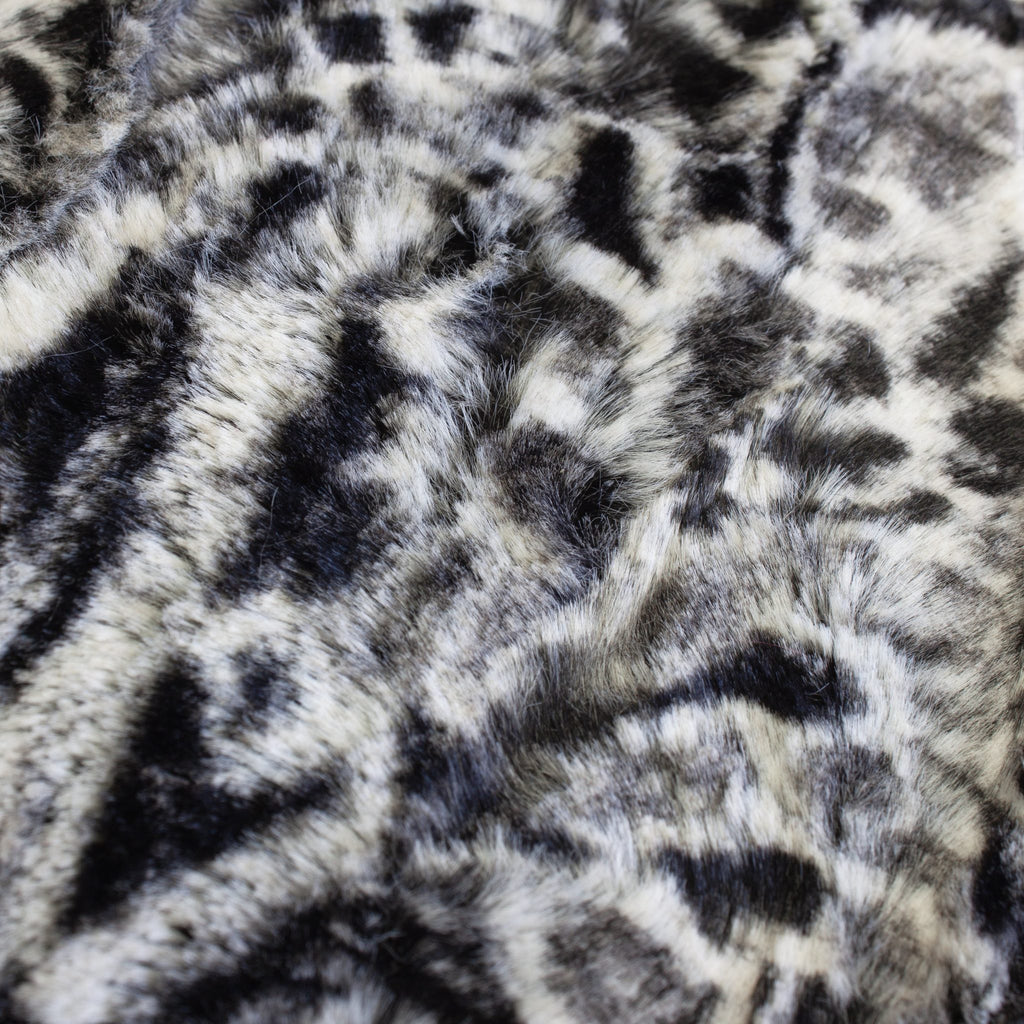 black spotted leopard snuggle minky fabric, folded drape