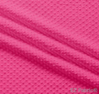 Silky minky dot fabric hot pink, close-up