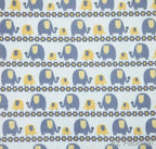 Marching elephants yellow print minky fabric, close-up
