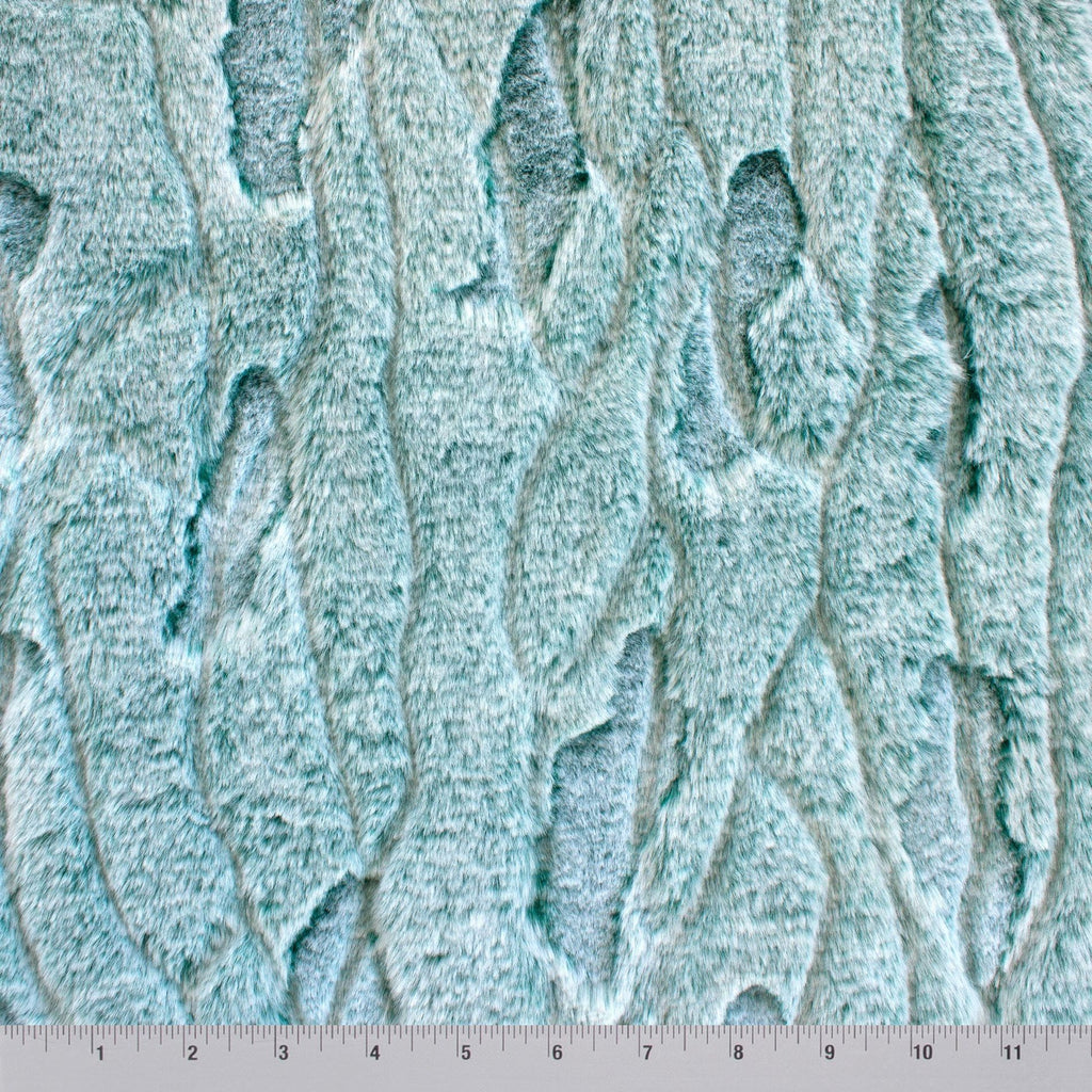 Frosted Four Seasons Snuggle minky fabric draped throw